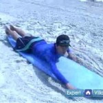 How to Surf : How to Paddle on the Surf Board: Beginning Surfing Lesson