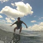 Surfing Waikiki with a Longboard and GoPro hire from “Waikiki Surfboard Rentals”